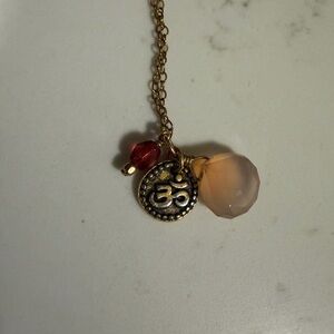 Elephantine gold-fill long necklace with pink teardrop and red bead and om charm